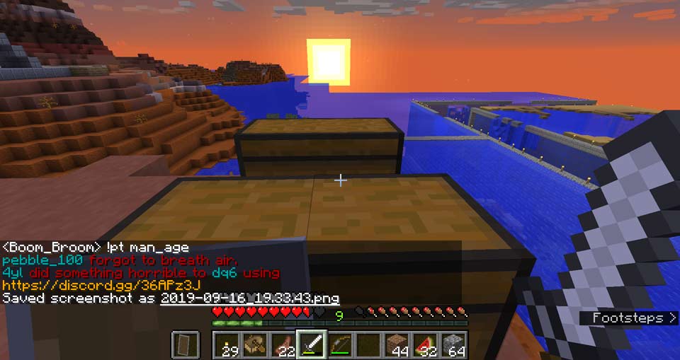 Large chests next to ocean monument full of building materials